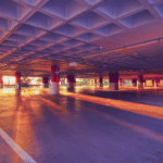 A parking garage providing mobility options at sunset.