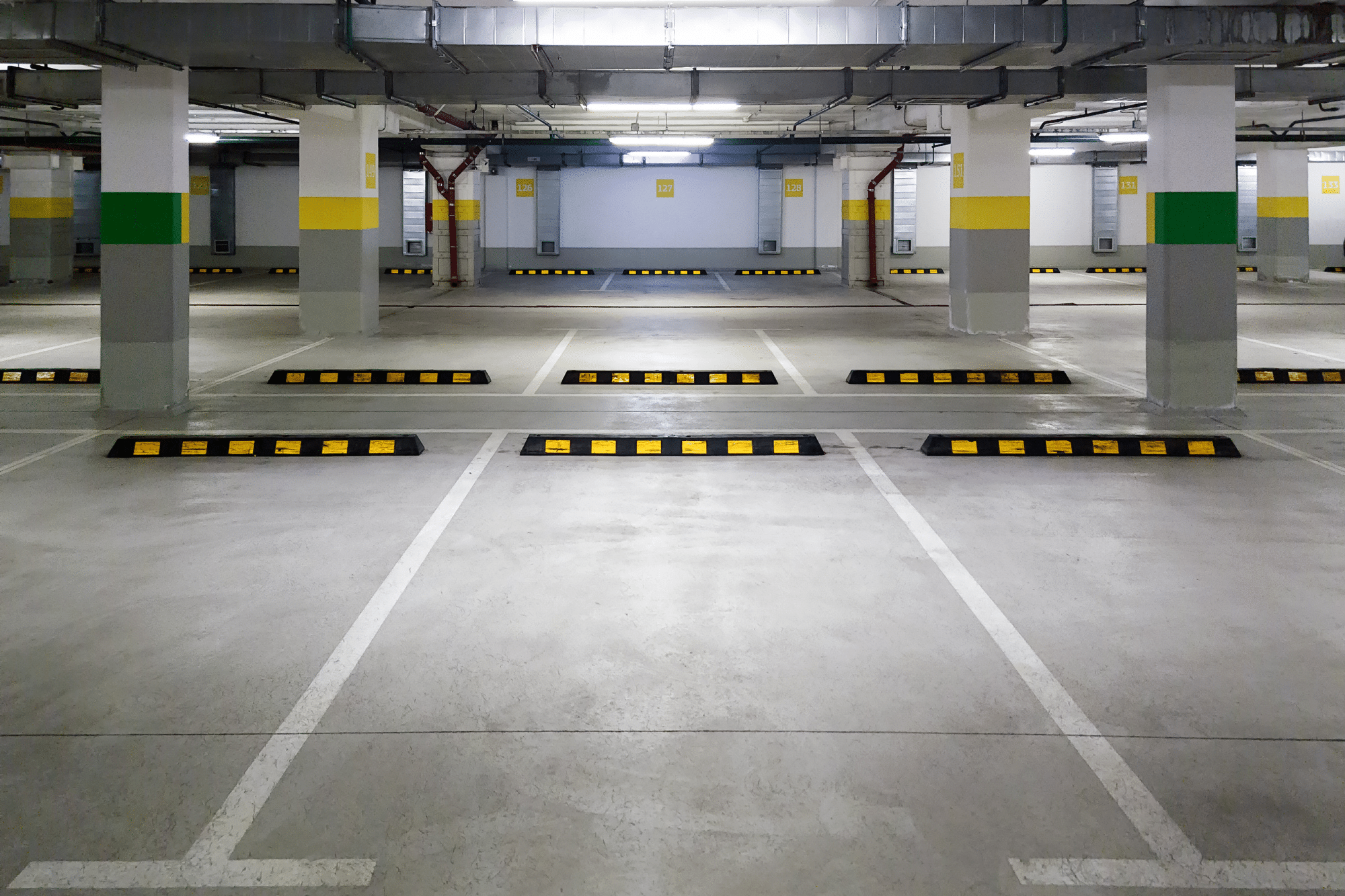 Editor's Note: A parking lot with yellow and green stripes.