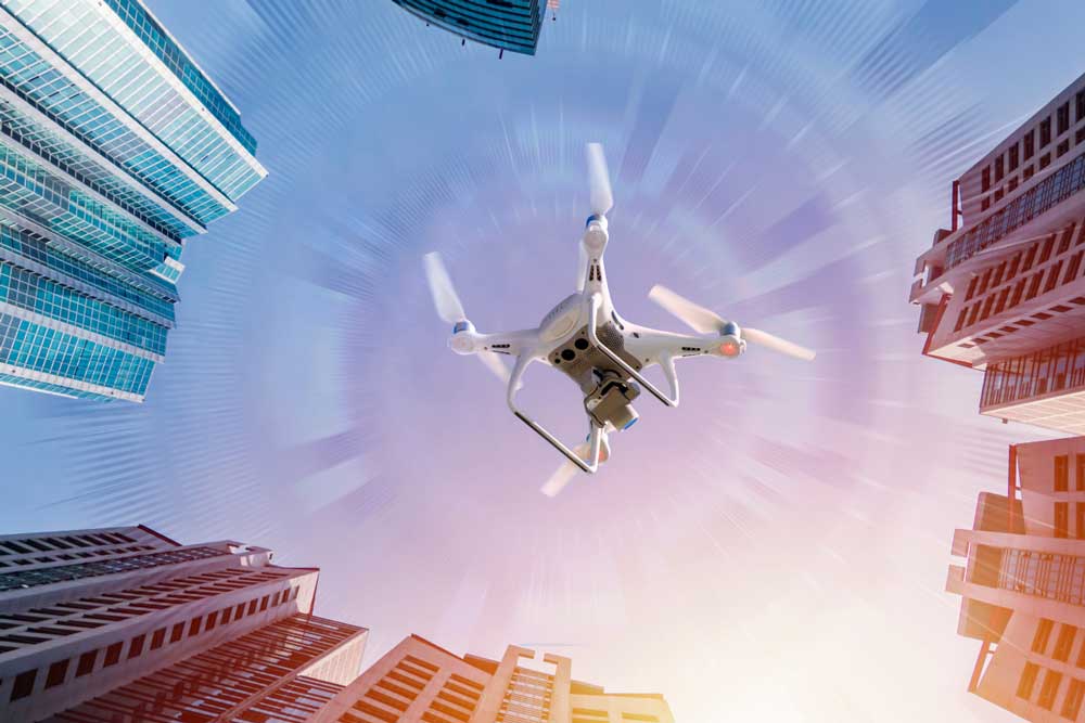 drone flying through city