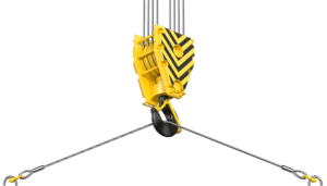 A yellow crane with a hook attached to it, used for lifting heavy objects in accordance with durability standards.