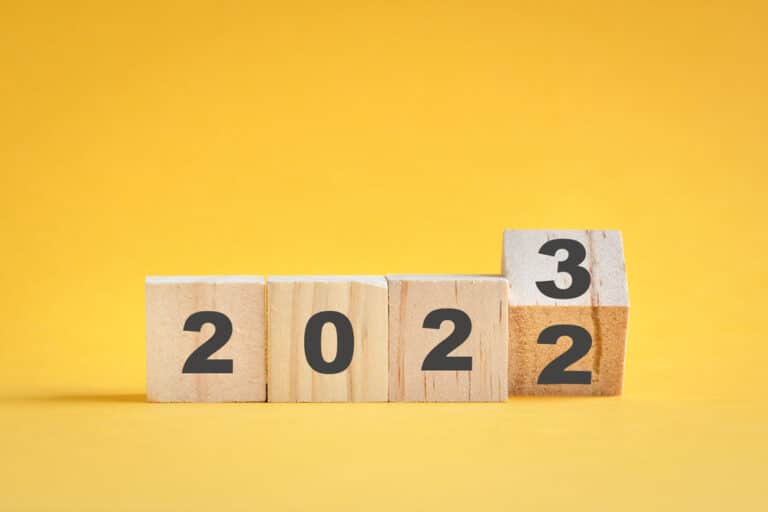 A set of wooden blocks with the numbers 2020 and 2021 on a yellow background, available for parking.