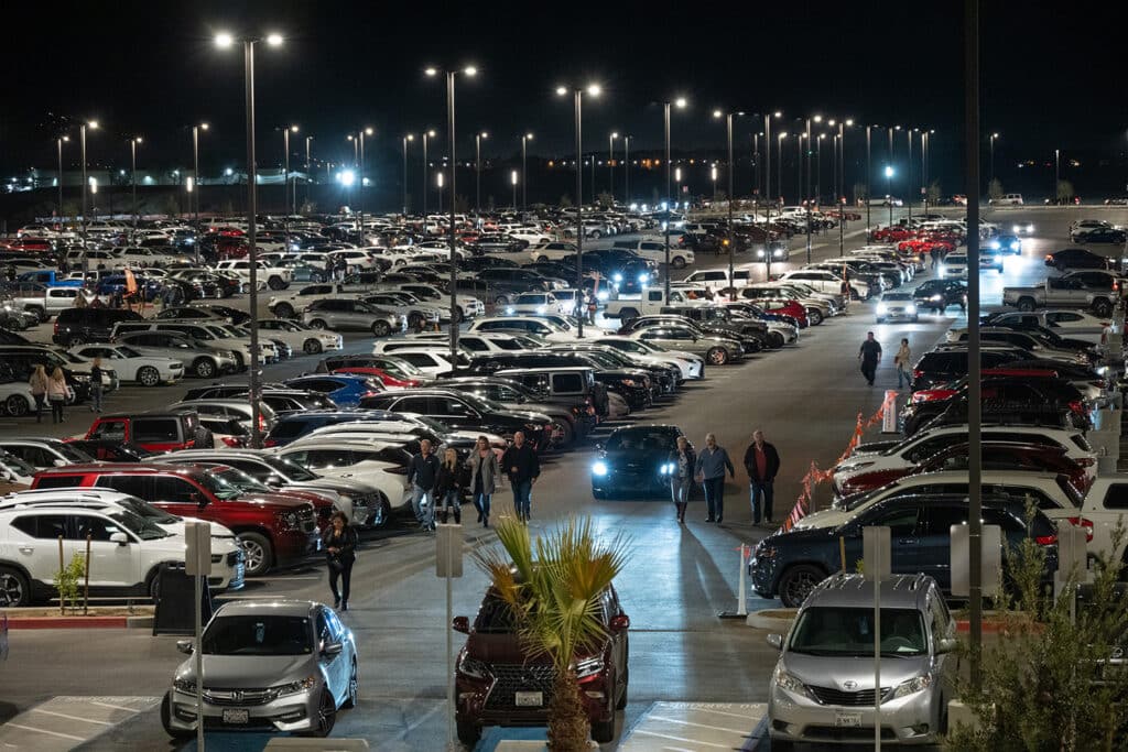 Busy parking lot at a night time event