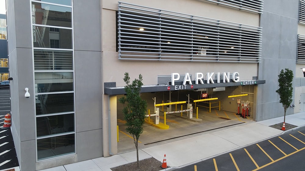 The Green Street Parking Garage, situated in front of a building, offers convenient parking solutions for visitors and patrons. Managed by THA Consulting, this state-of-the-art facility ensures a hassle-free