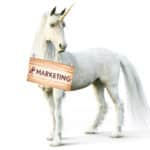 A unicorn holding a sign that says Event Parking and Mobility.