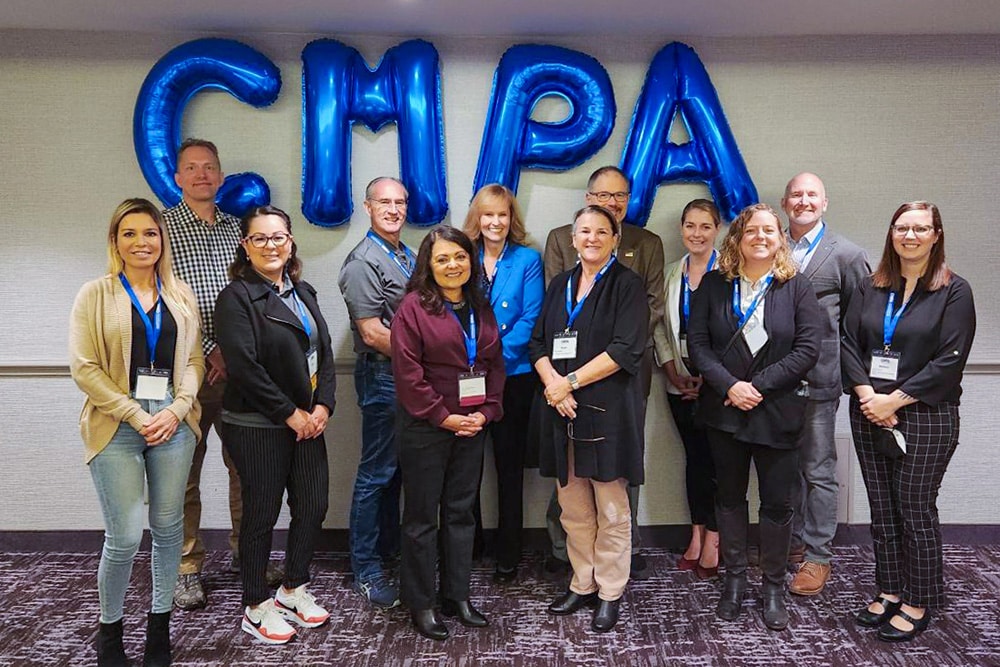 Group photo of CMPA members at the Mentor breakfast