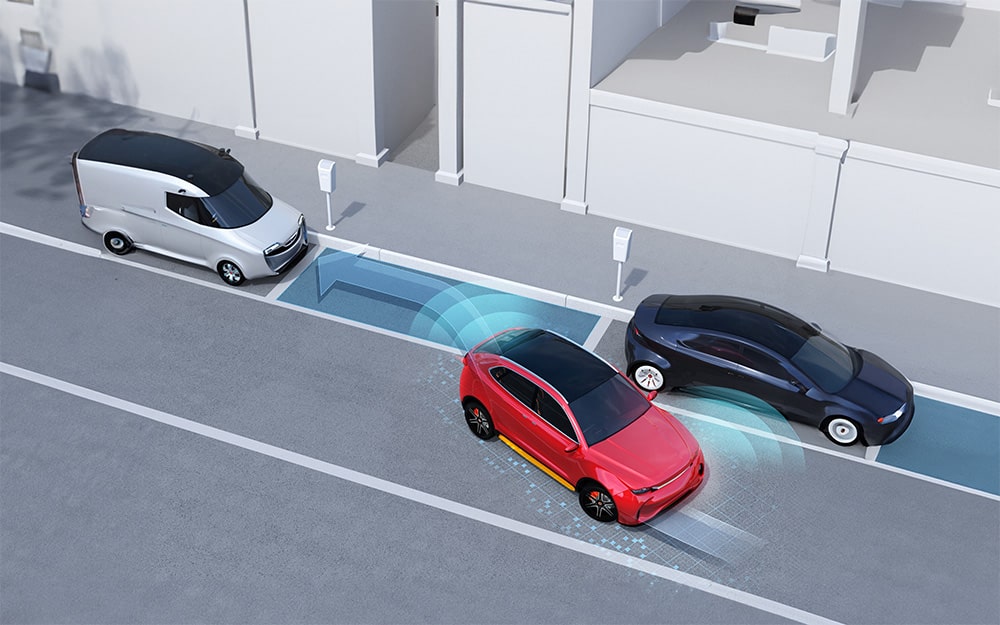 Futuristic vehicles at charging stations with digital overlays indicating an autonomous car self-parking.