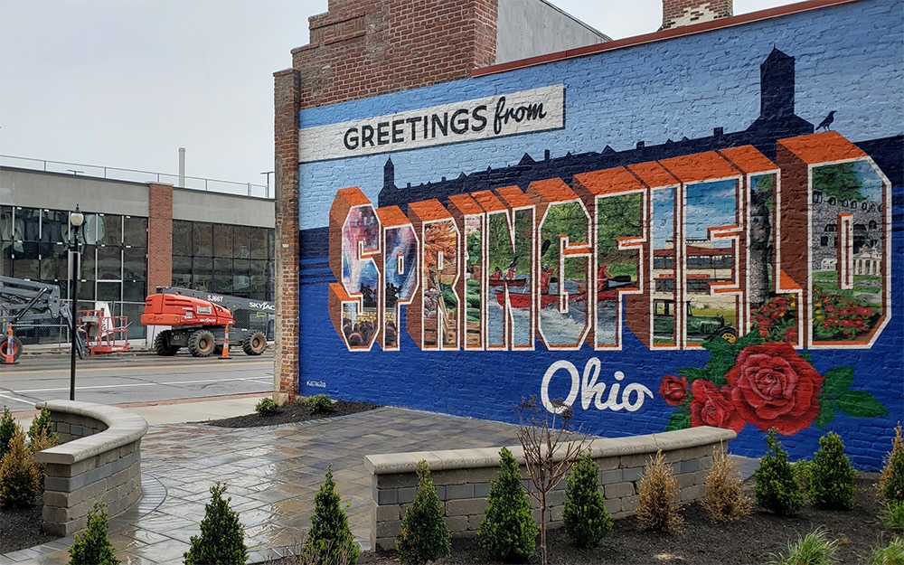 Vibrant mural of Springfield, Ohio, displaying its landmarks and culture.