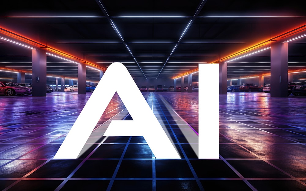 The word ai is in the middle of a parking garage.