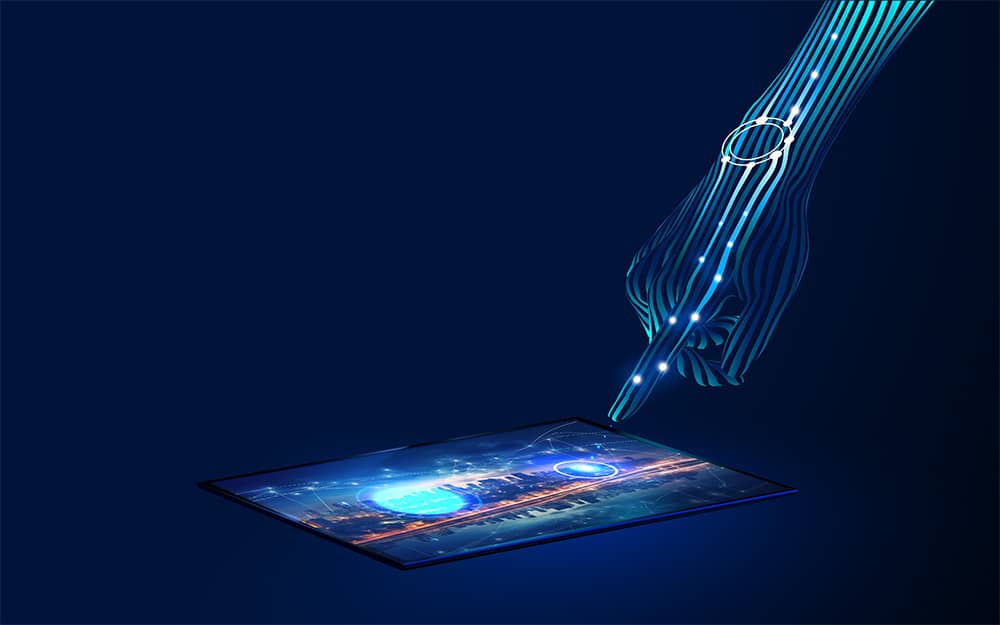 A hand holding a tablet with a glowing light on it, showcasing the Smart Technology revolution.
