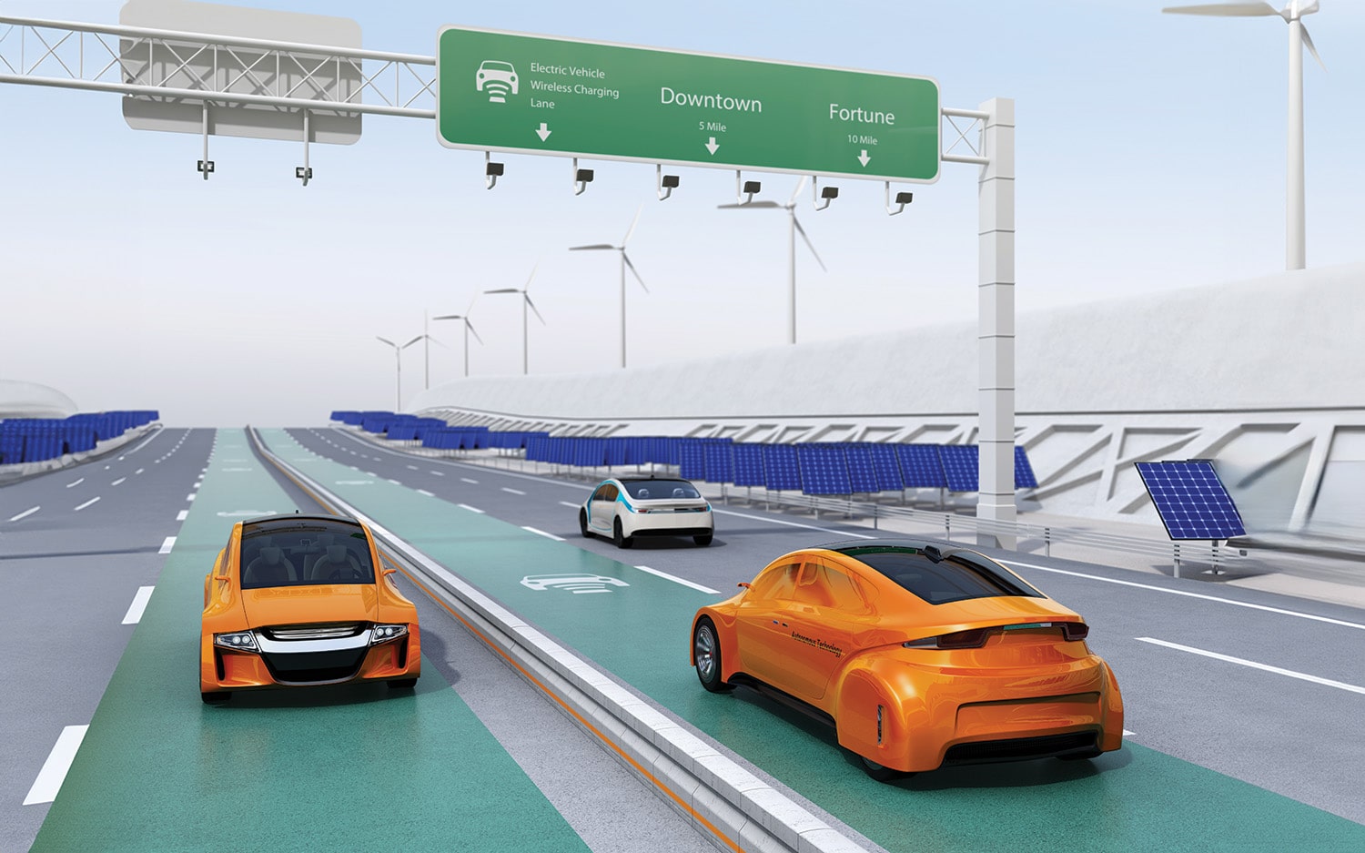 Electric vehicles driving on a dedicated lane with overhead digital traffic signs and solar panels on the side of the road.
