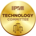 A gold circle with text and a logo, symbolizing technology innovation.