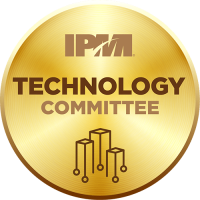 A gold circle with text and a logo, symbolizing technology innovation.